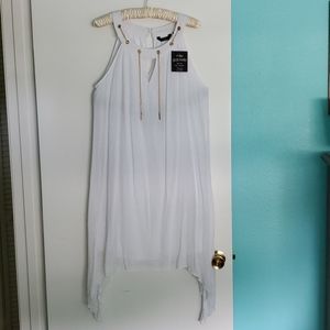 White summer dress, sharkbite hem